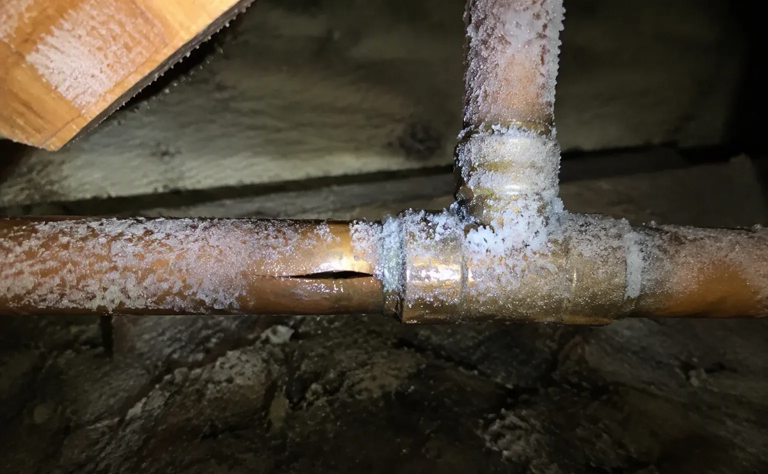 Burst pipe repair and water cleanup in a Salisbury bathroom